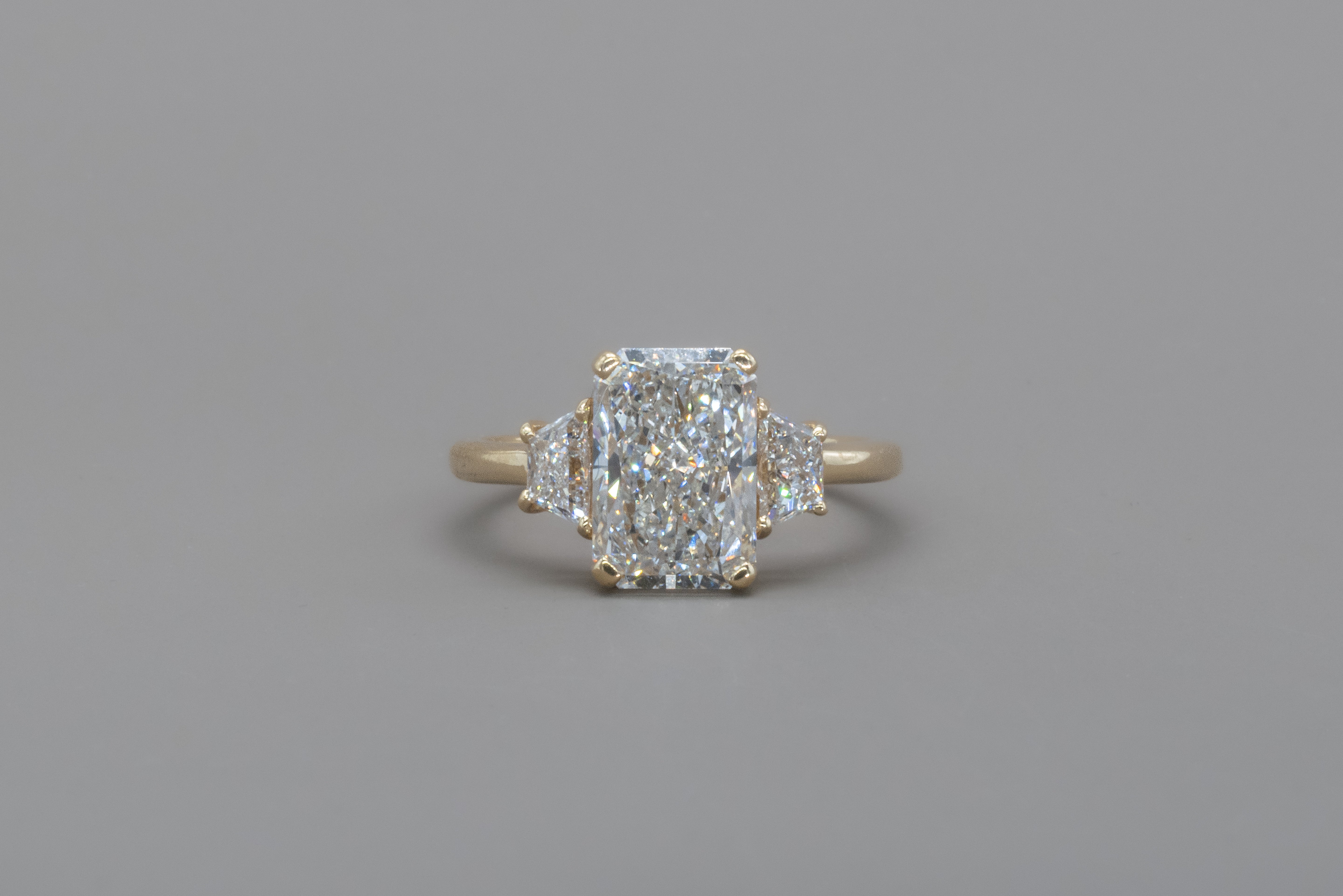 TRIO RADIANT ENGAGEMENT RING